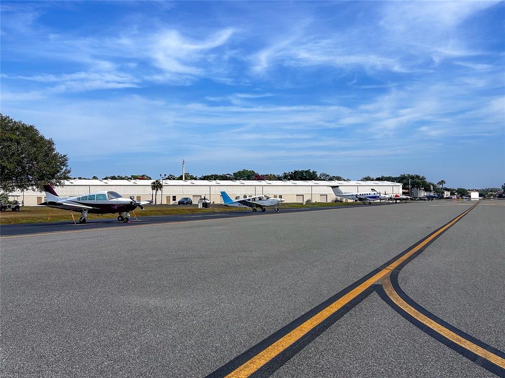 1985 Rutgers Place, Unit 1985 Port Orange, FL 32128 - Photo 45 of 56 a view of car parked on city street