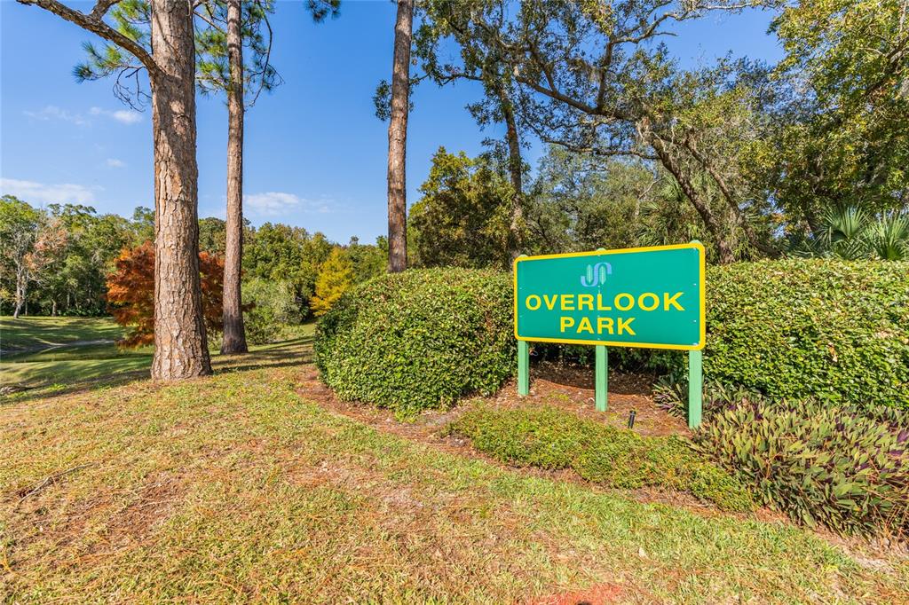 1985 Rutgers Place, Unit 1985 Port Orange, FL 32128 - Photo 49 of 56 a view of outdoor space with sign board