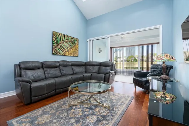 a living room with furniture and a window