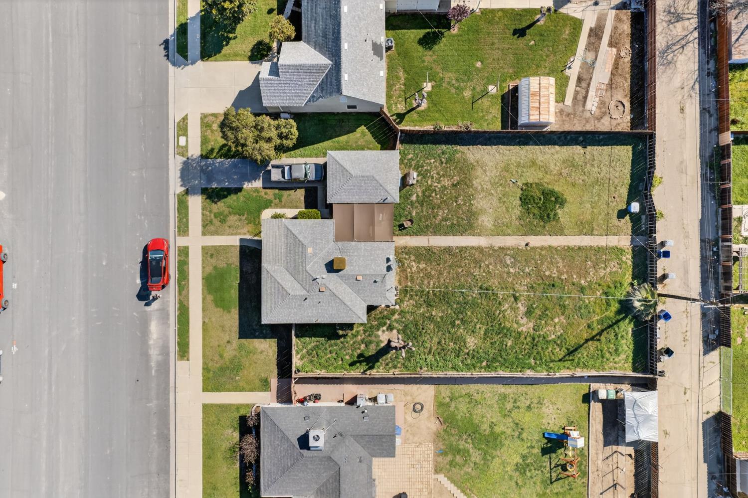 248 Harrison Street Coalinga, CA 93210 - Photo 18 of 30 an aerial view of residential house with outdoor space and swimming pool