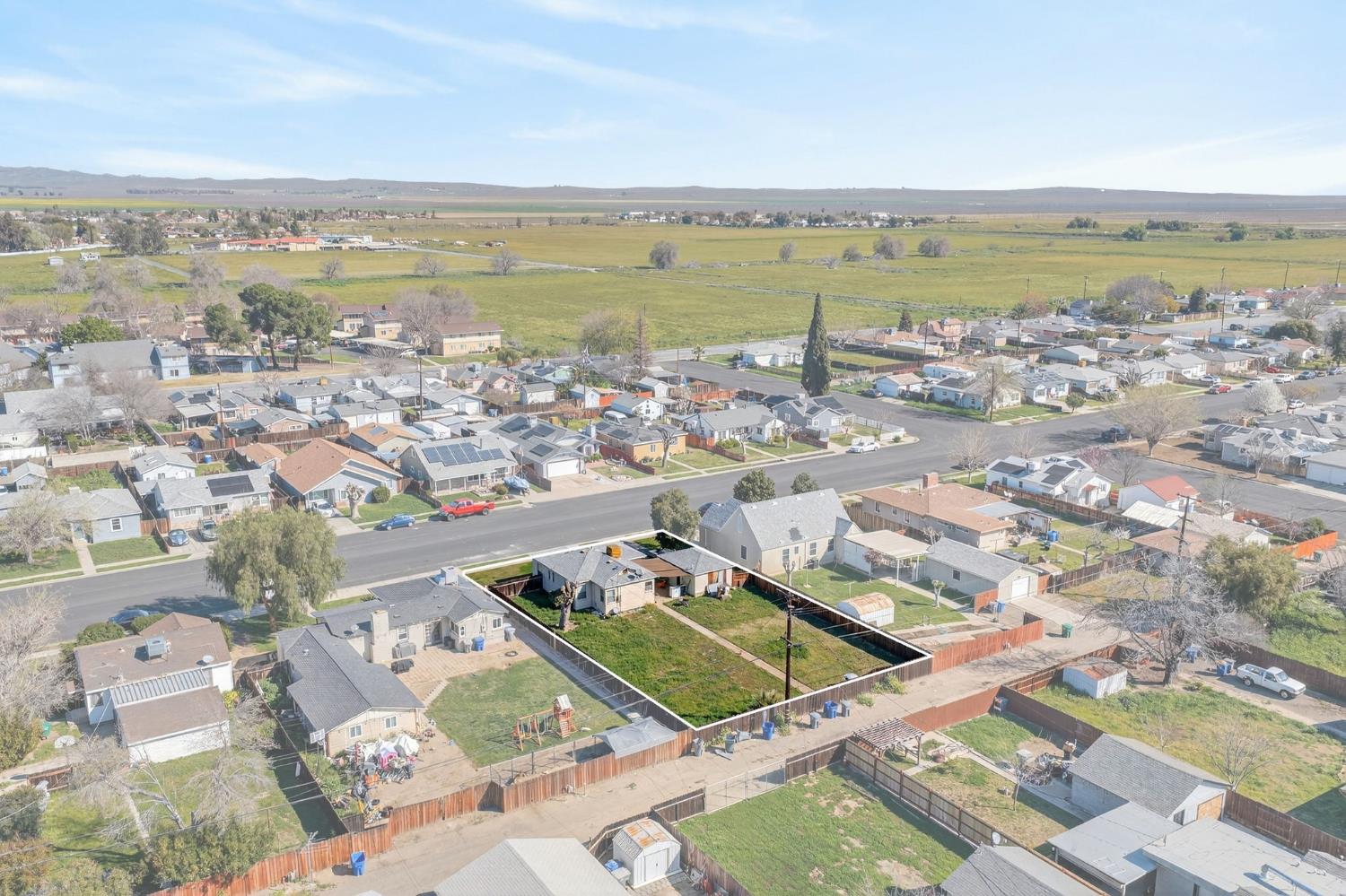 248 Harrison Street Coalinga, CA 93210 - Photo 27 of 30 an aerial view of ocean and residential houses with outdoor space