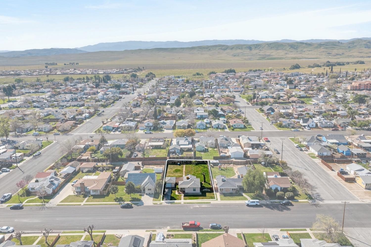 248 Harrison Street Coalinga, CA 93210 - Photo 28 of 30 an aerial view of residential building and ocean view