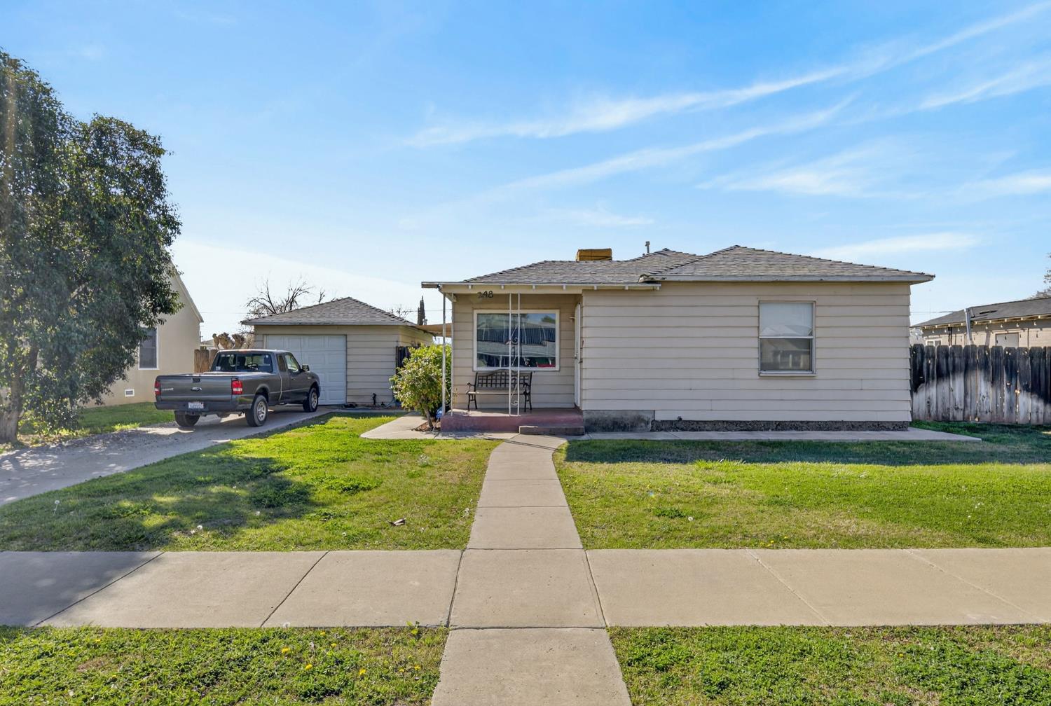 248 Harrison Street Coalinga, CA 93210 - Photo 5 of 30 a aerial view of a house with garden