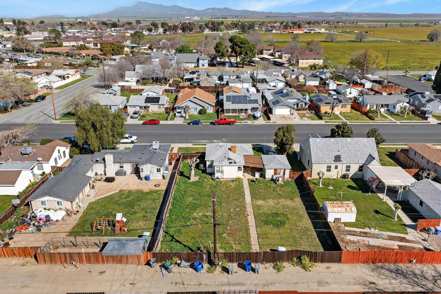 248 Harrison Street Coalinga, CA 93210 - Photo 8 of 30 an aerial view of residential houses with outdoor space