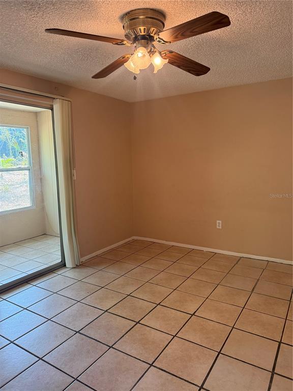 4244 Sheldon Place, Unit 4244 New Port Richey, FL 34652 - Photo 12 of 23 a view of an empty room and window