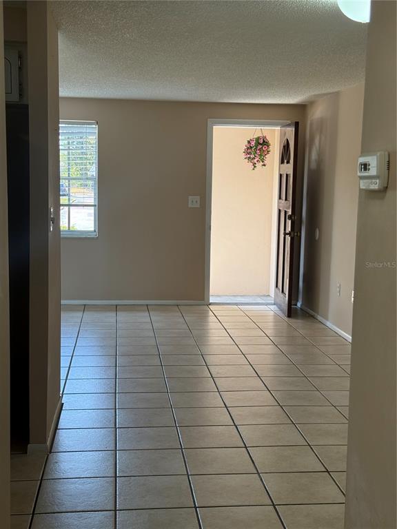 4244 Sheldon Place, Unit 4244 New Port Richey, FL 34652 - Photo 14 of 23 a view of a livingroom with an empty space and a window