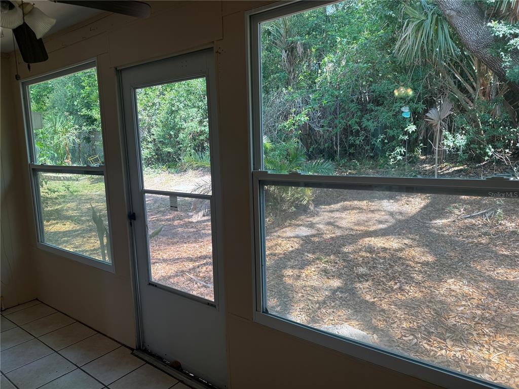 4244 Sheldon Place, Unit 4244 New Port Richey, FL 34652 - Photo 16 of 23 a view of a lake from a window