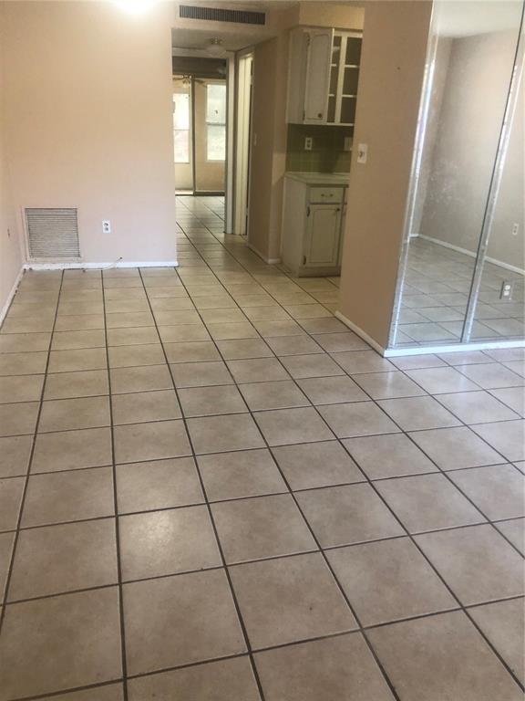 4244 Sheldon Place, Unit 4244 New Port Richey, FL 34652 - Photo 9 of 23 a view of a livingroom with an empty space and window