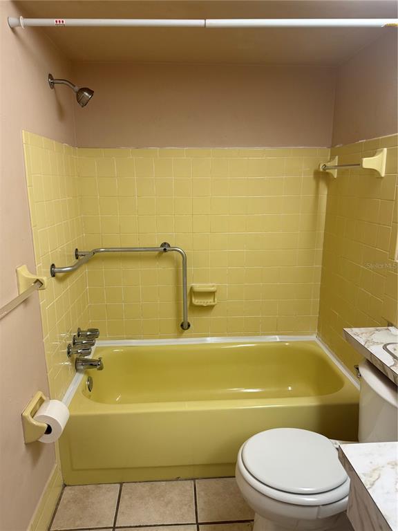 4244 Sheldon Place, Unit 4244 New Port Richey, FL 34652 - Photo 10 of 23 a bathroom with a toilet and a bathtub