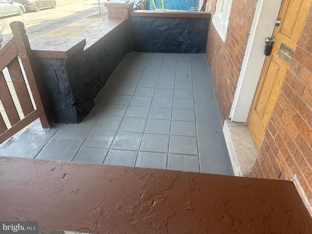 1220 North Potomac Street Baltimore, MD 21213 - Photo 34 of 34 View of covered front porch for people watching