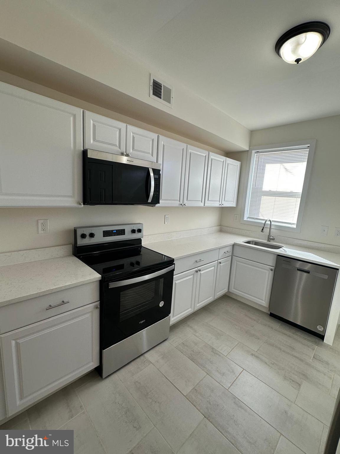 1220 North Potomac Street Baltimore, MD 21213 - Photo 9 of 34 Kitchen View w/ new SS appliances