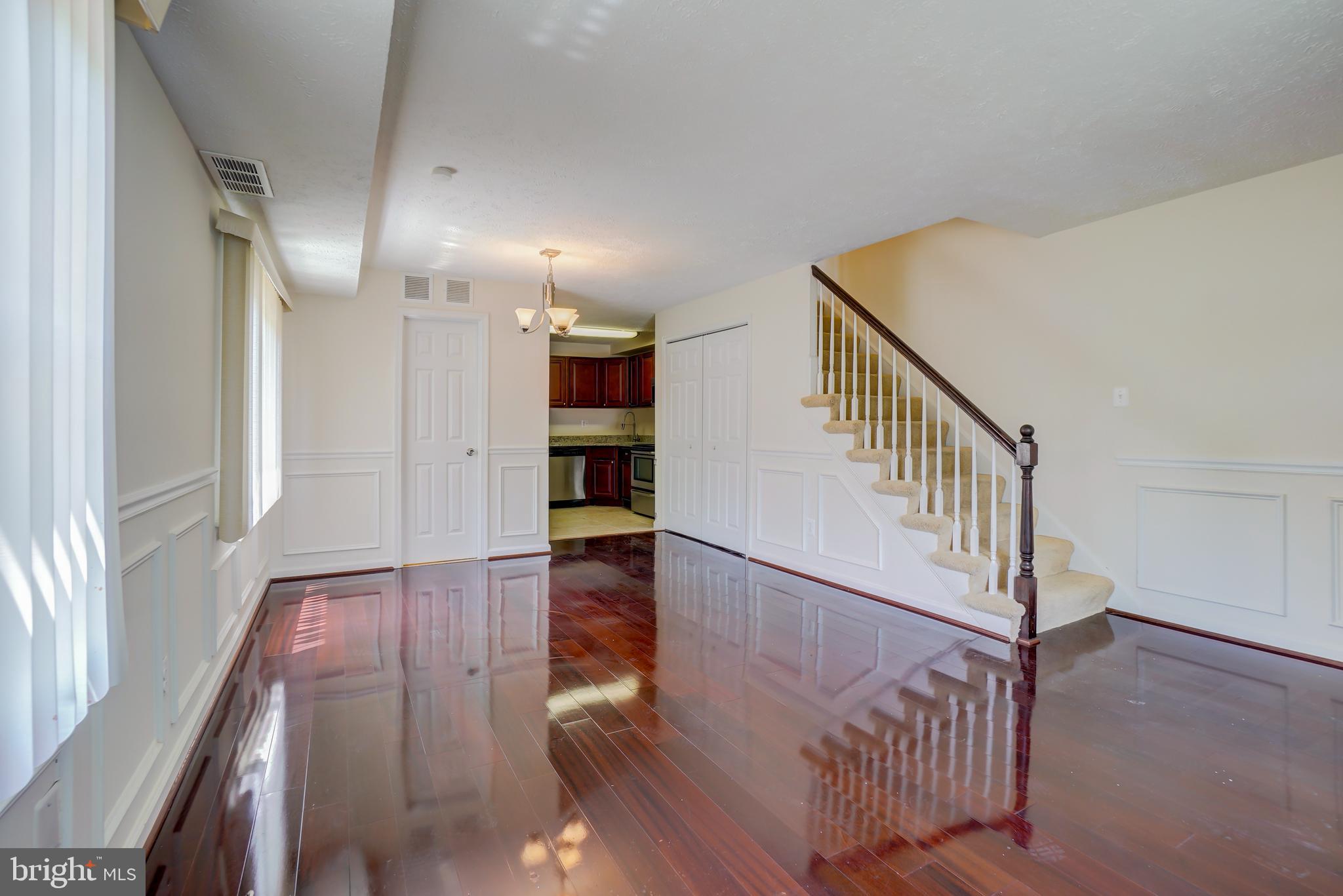 628 Four Mile Road Alexandria, VA 22305 - Photo 6 of 29 a view of entryway with wooden floor