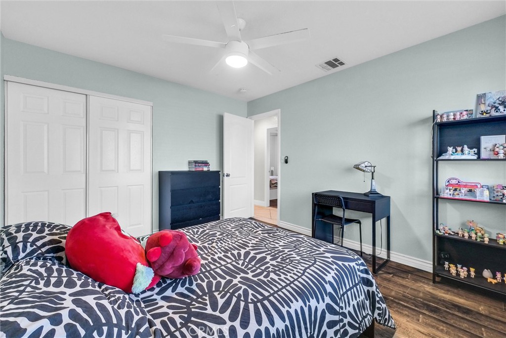 6220 Filkins Avenue Rancho Cucamonga, CA 91737 - Photo 23 of 37 a bedroom with a bed and a closet