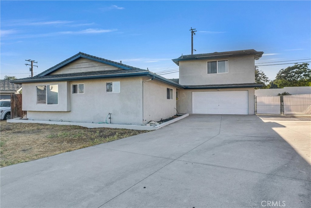 6220 Filkins Avenue Rancho Cucamonga, CA 91737 - Photo 5 of 37 a view of a house with a yard