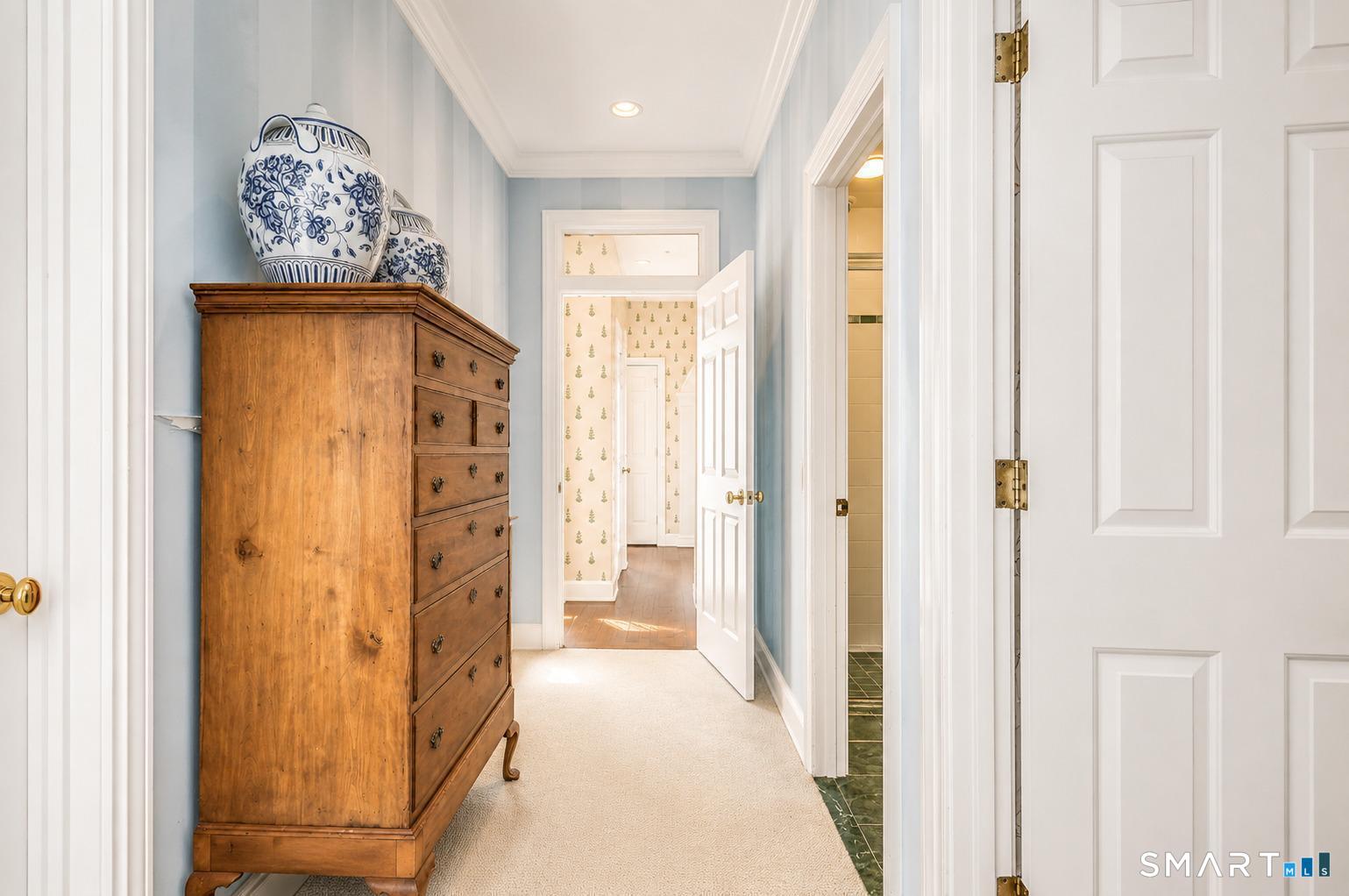 1681 Fairfield Beach Road Fairfield, CT 06824 - Photo 20 of 36 The primary suite offers two walk-in closets and two private baths, creating exceptional space and flexibility.