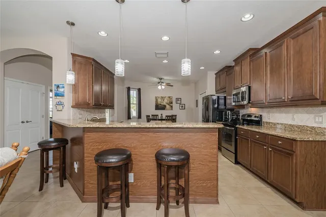 a work room with furniture and windows