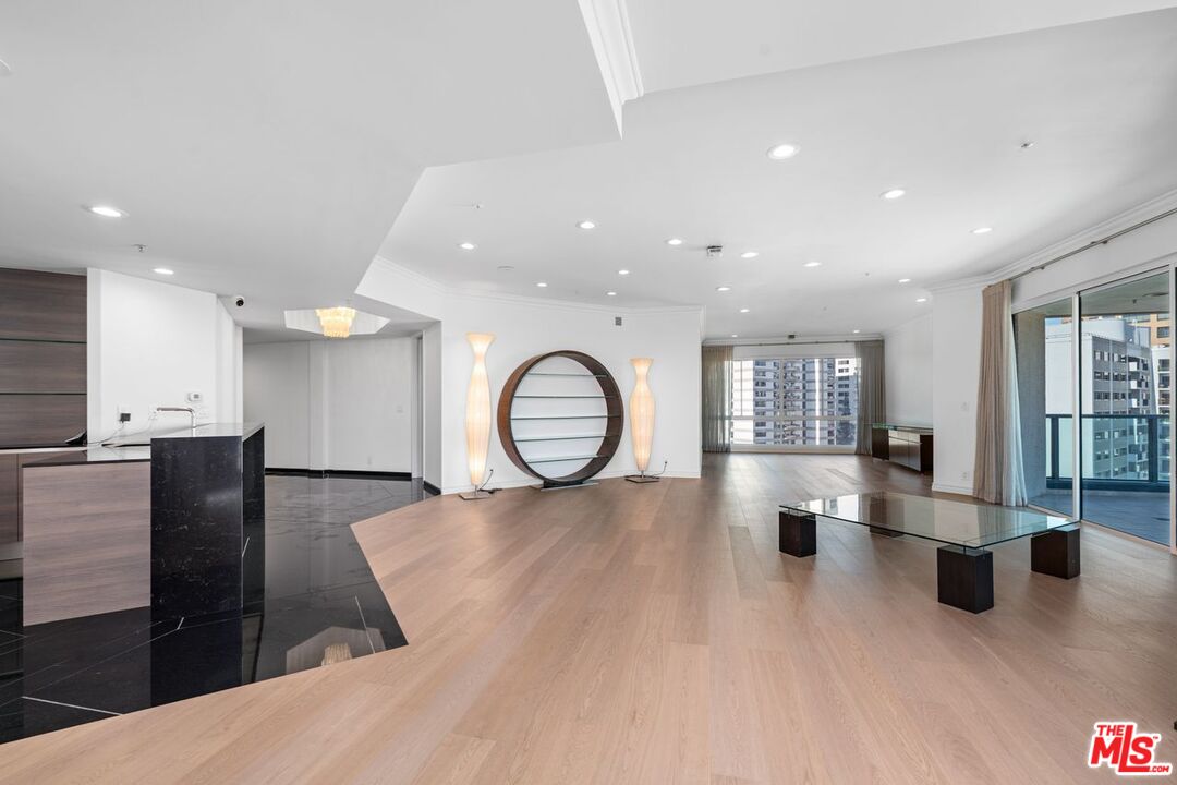 10490 Wilshire Boulevard, Unit 1004 Los Angeles, CA 90024 - Photo 5 of 45 a view of kitchen with granite countertop lots of counter top space