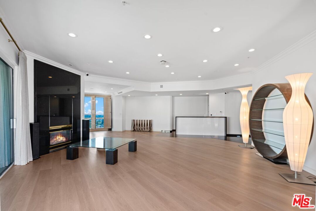 10490 Wilshire Boulevard, Unit 1004 Los Angeles, CA 90024 - Photo 9 of 45 a view of a kitchen with a sink and a large window