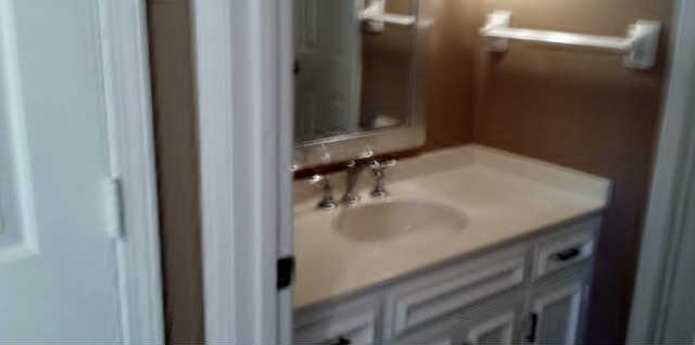 856 General George Patton Road Nashville, TN 37221 - Photo 8 of 12 a bathroom with a sink and a mirror
