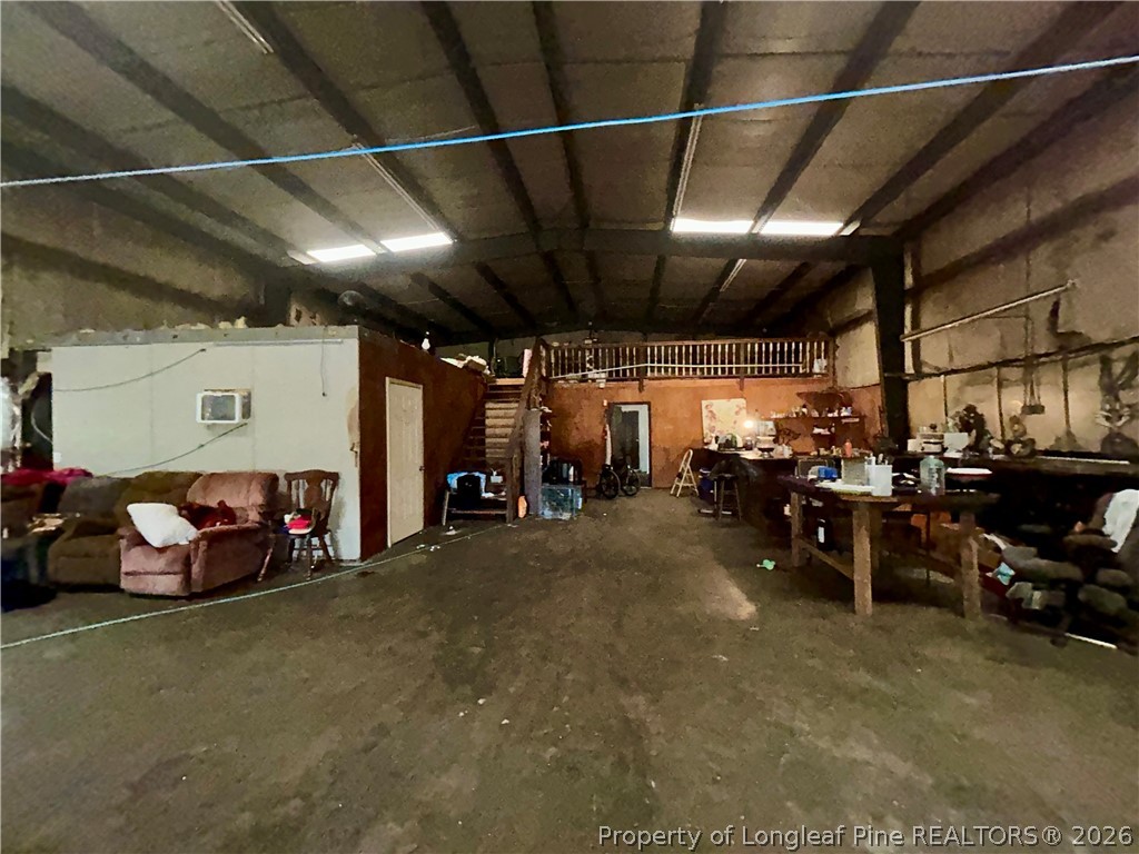 918 Opal Road Red Springs, NC 28377 - Photo 17 of 26 a view of a garage with cars