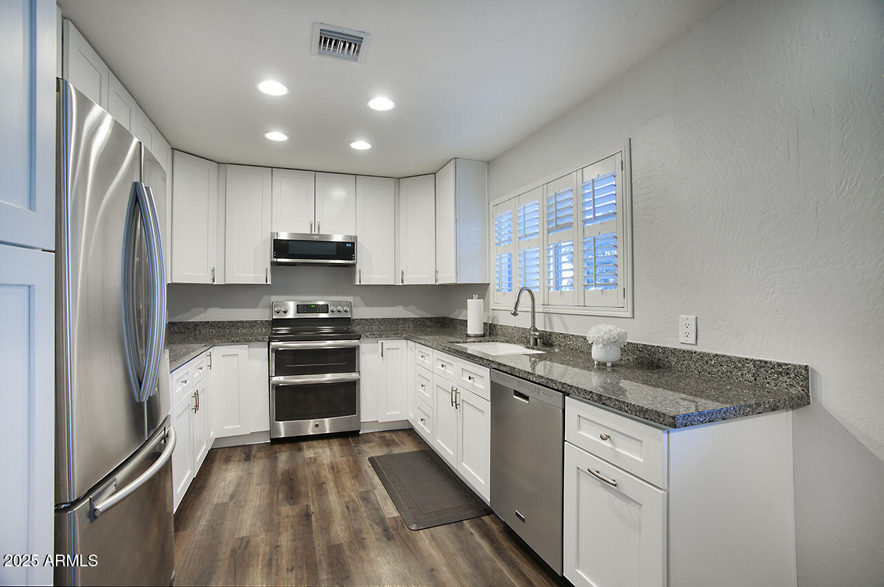 4339 East Osborn Road Phoenix, AZ 85018 - Photo 7 of 21 Tons of cabinets.