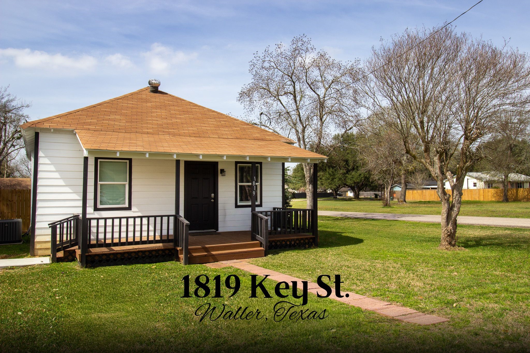 1819 Key Street Waller, TX 77484 - Photo 1 of 19 a view of a house with a yard