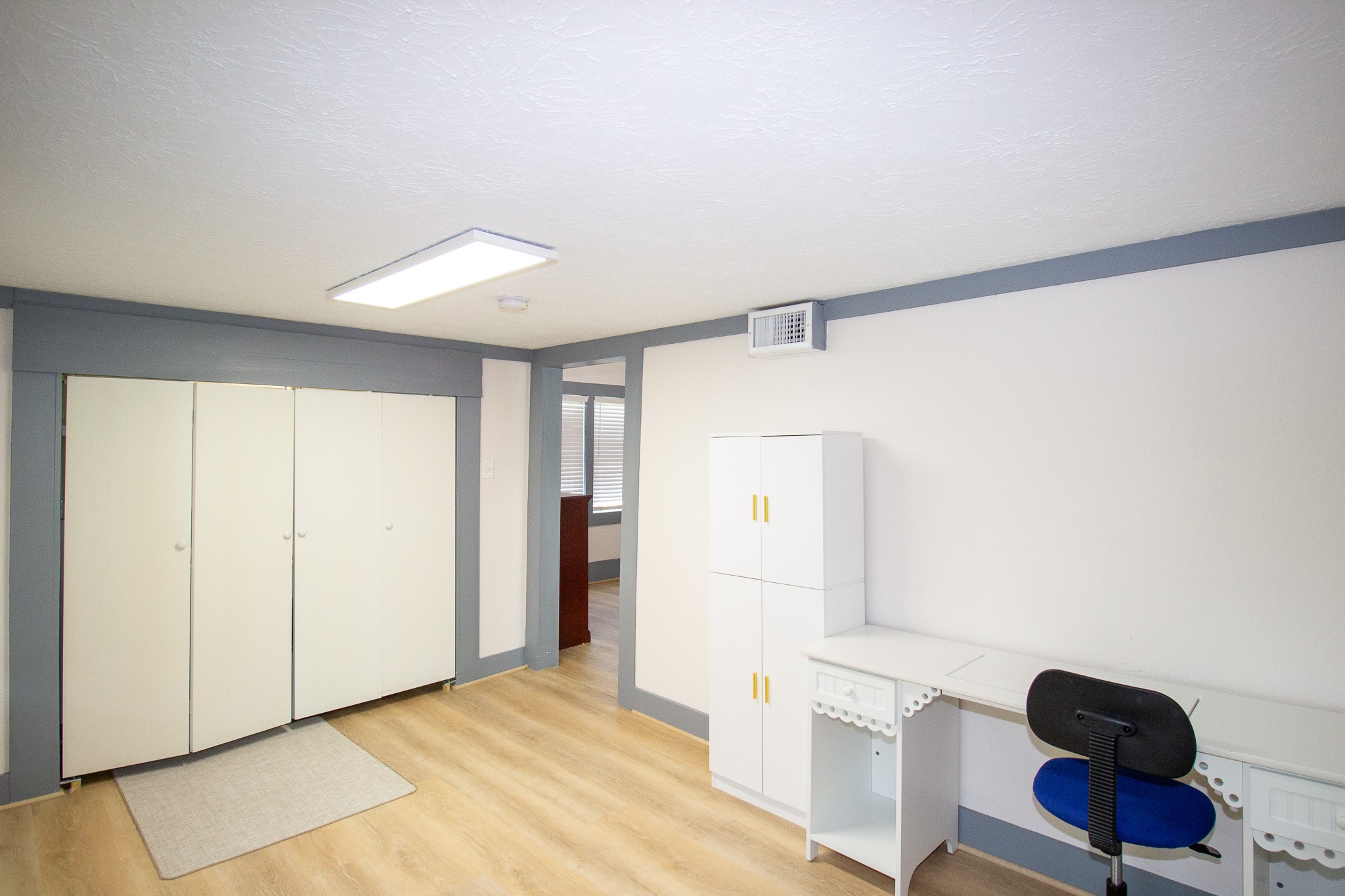 1819 Key Street Waller, TX 77484 - Photo 12 of 19 a view of an empty room with furniture and a window
