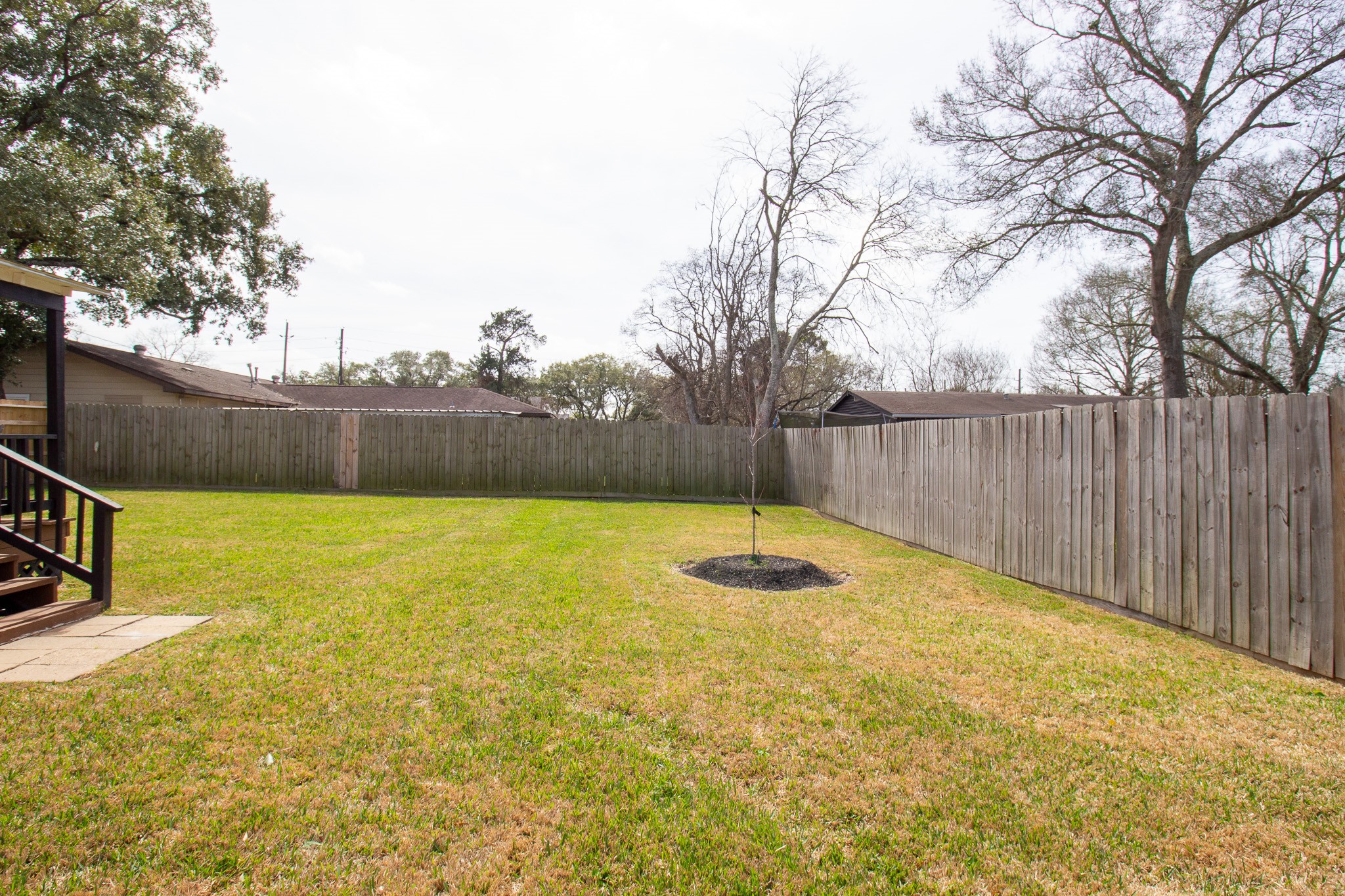 1819 Key Street Waller, TX 77484 - Photo 18 of 19 a view of swimming pool with tree in the background