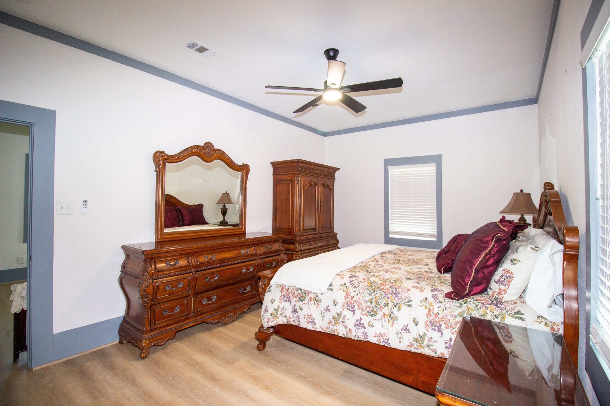 1819 Key Street Waller, TX 77484 - Photo 7 of 19 a bedroom with a bed window and dresser