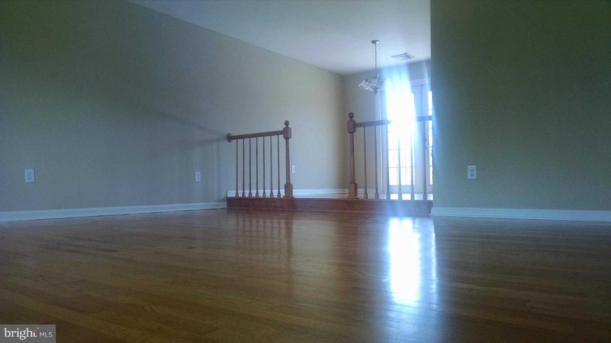 3493 Salem Bottom Road Westminster, MD 21157 - Photo 13 of 30 a view of empty room with wooden floor and fan