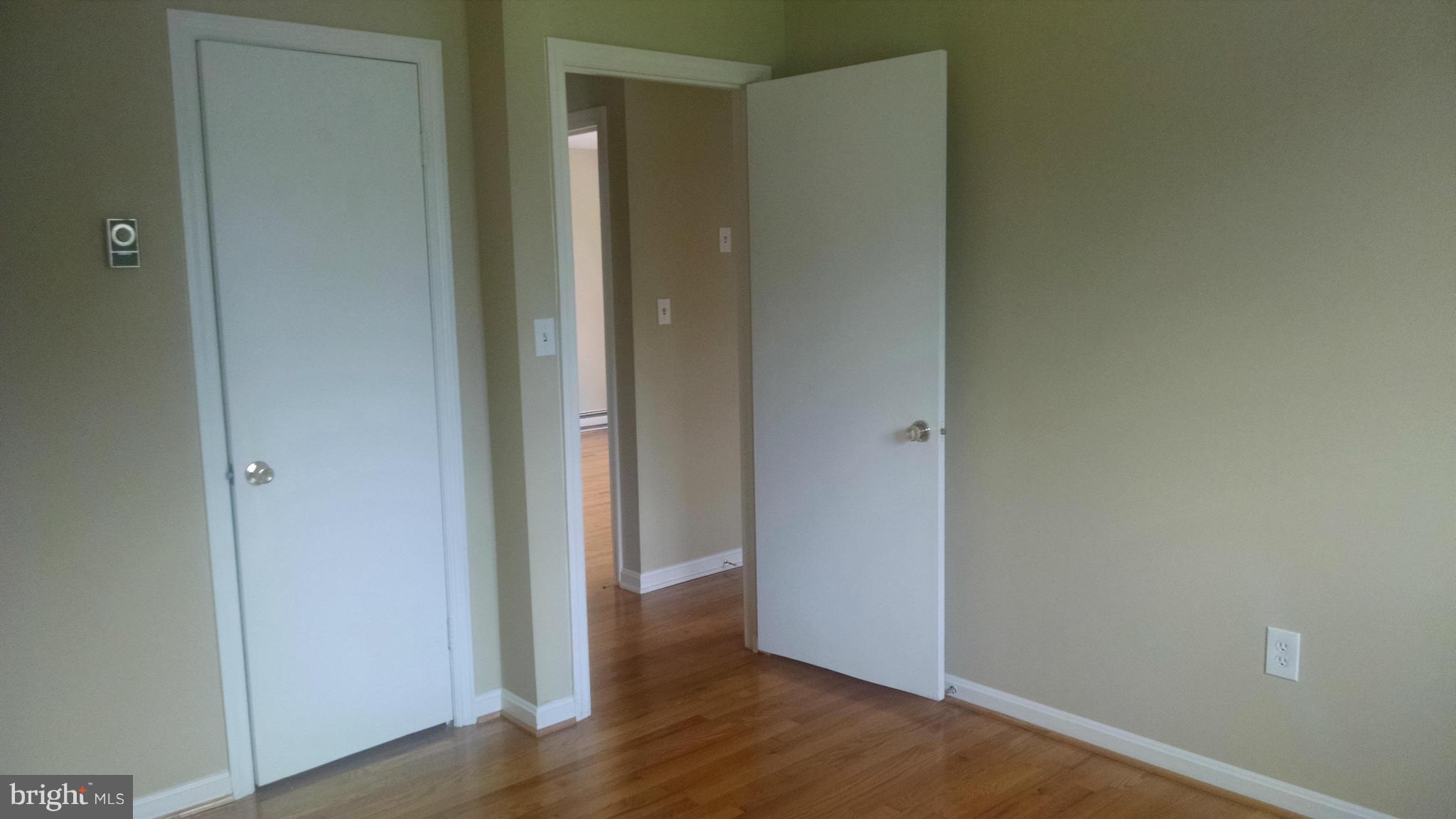 3493 Salem Bottom Road Westminster, MD 21157 - Photo 22 of 30 a view of a hallway with wooden floor