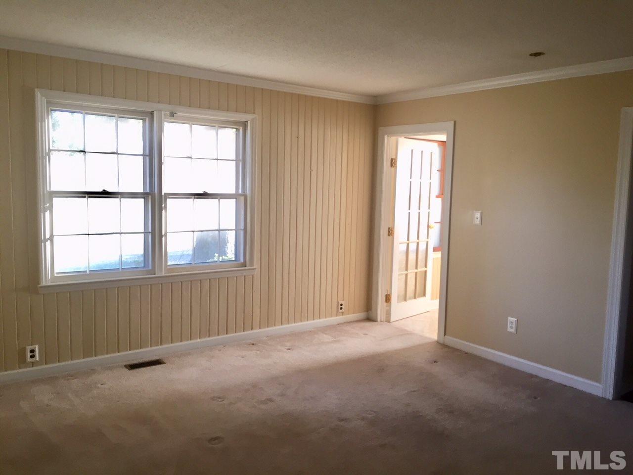 1088 Glover Road Dunn, NC 28334 - Photo 13 of 24 an empty room with windows