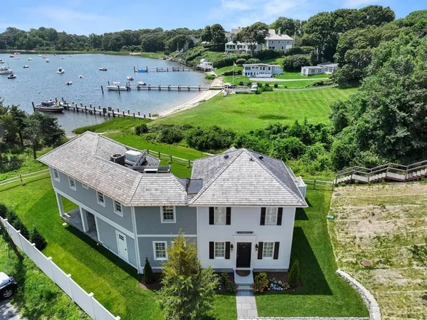 a aerial view of a house with a garden and plants