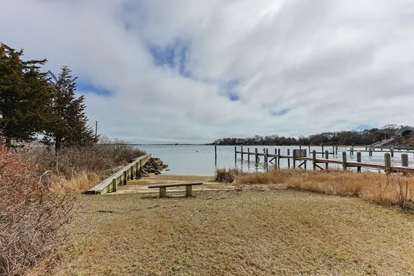 a view of a lake with a big yard