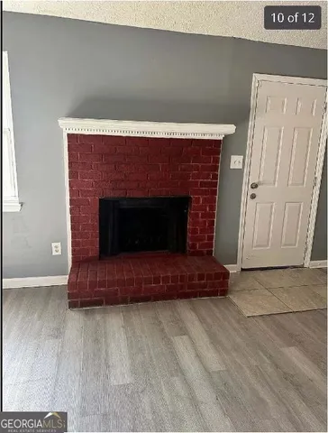 a living room with a fireplace
