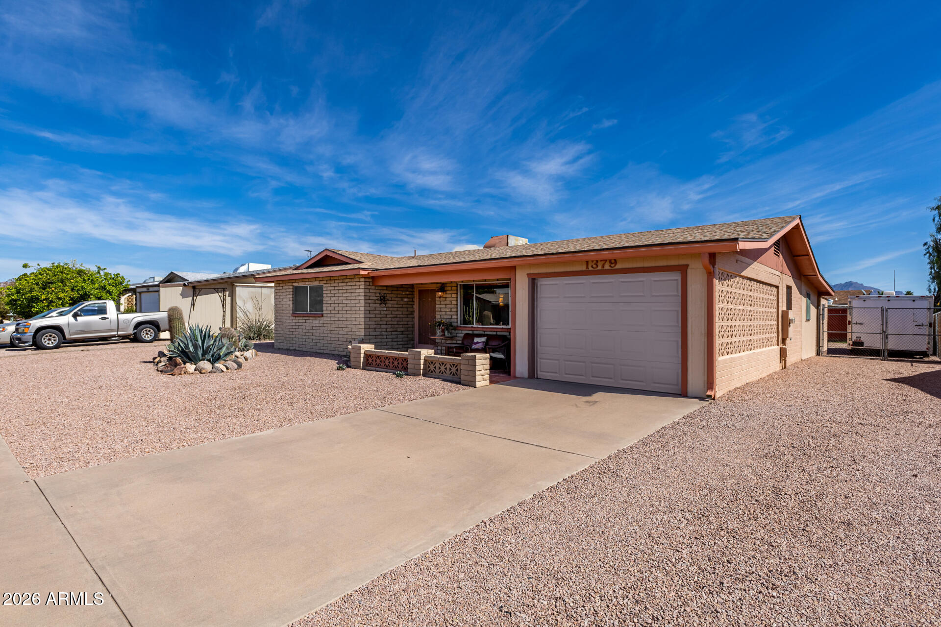 1379 South Main Drive Apache Junction, AZ 85120 - Photo 2 of 32 a house view with a outdoor space
