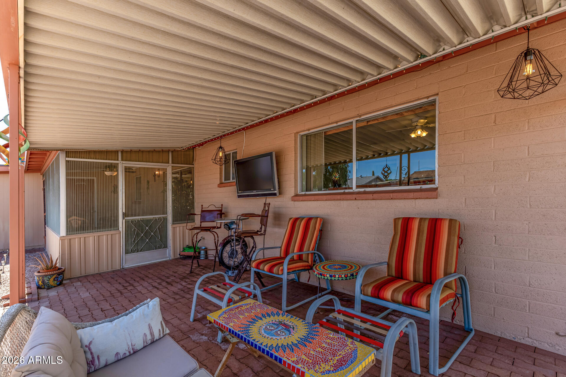 1379 South Main Drive Apache Junction, AZ 85120 - Photo 27 of 32 a living room with furniture and a flat screen tv