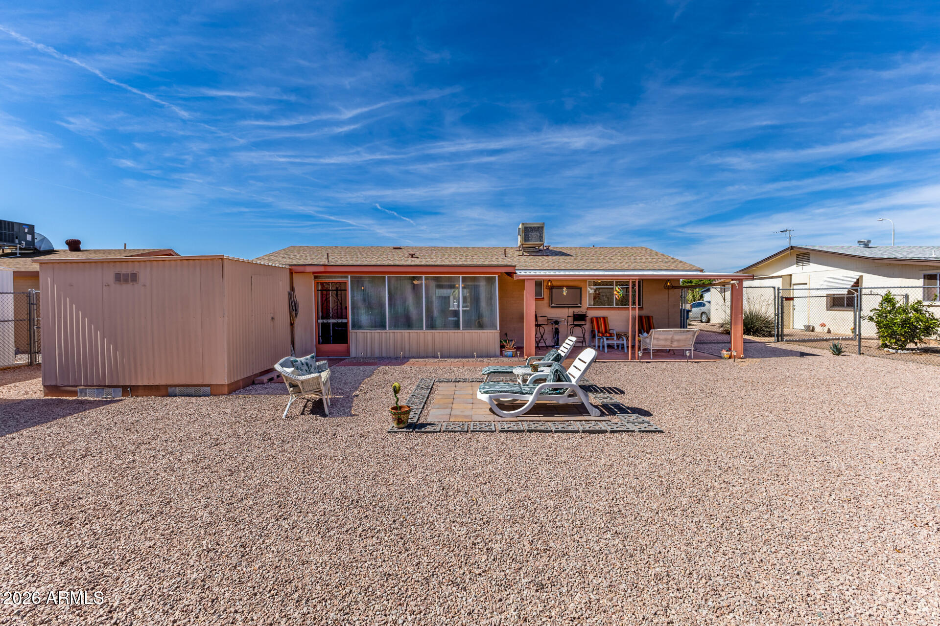1379 South Main Drive Apache Junction, AZ 85120 - Photo 29 of 32 a backyard of a house with seating space