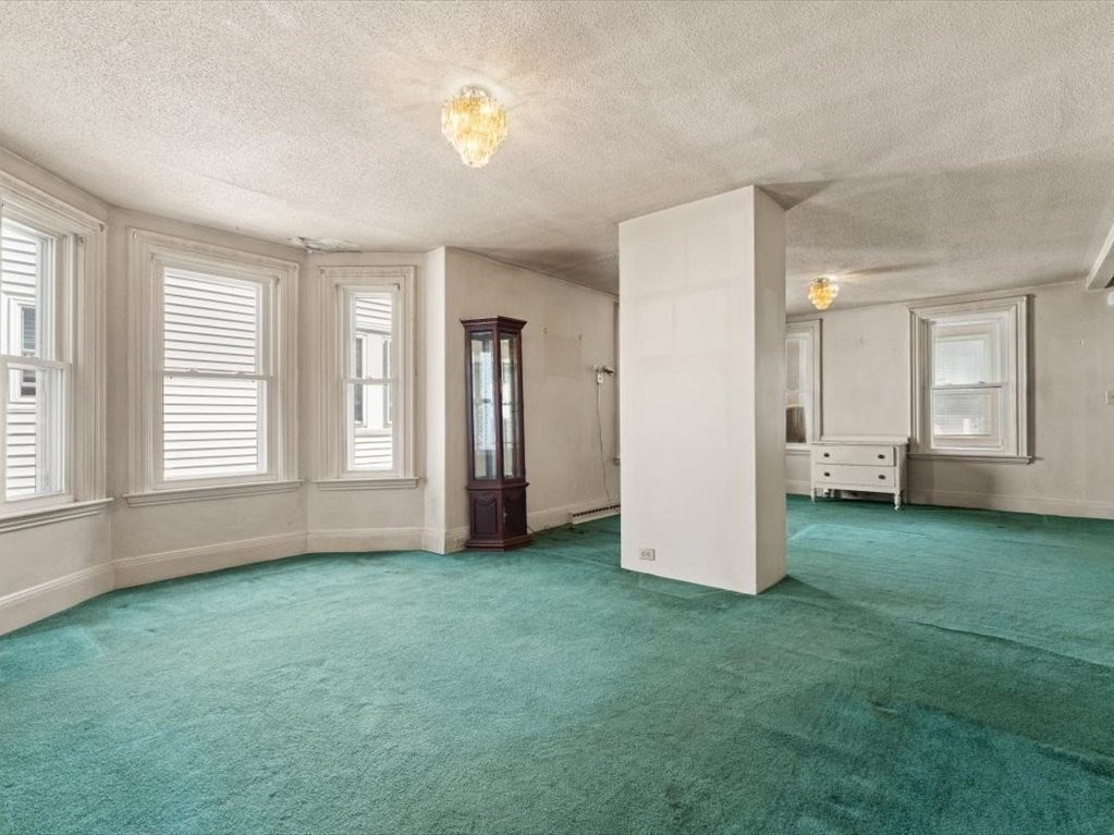 41 Sargent Street Winthrop, MA 02152 - Photo 15 of 40 an empty room with windows and closet