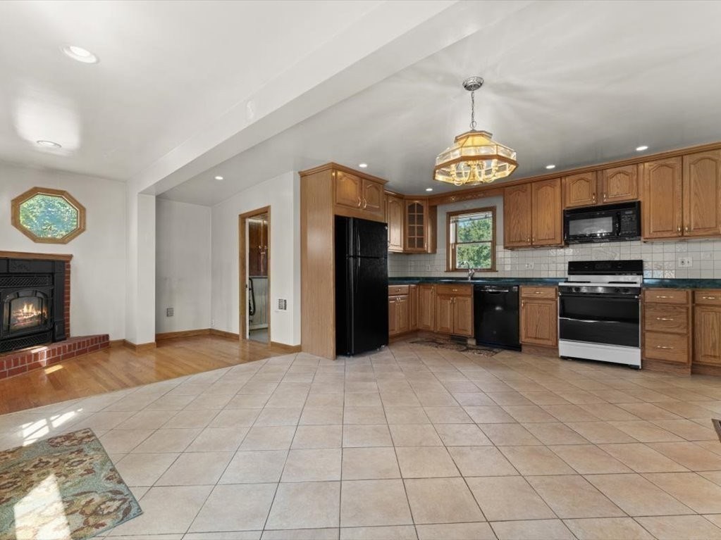 41 Sargent Street Winthrop, MA 02152 - Photo 18 of 40 a large kitchen with a stove and a refrigerator