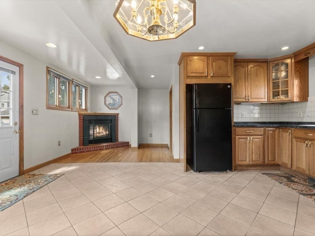 41 Sargent Street Winthrop, MA 02152 - Photo 23 of 40 a view of an empty room and fire place