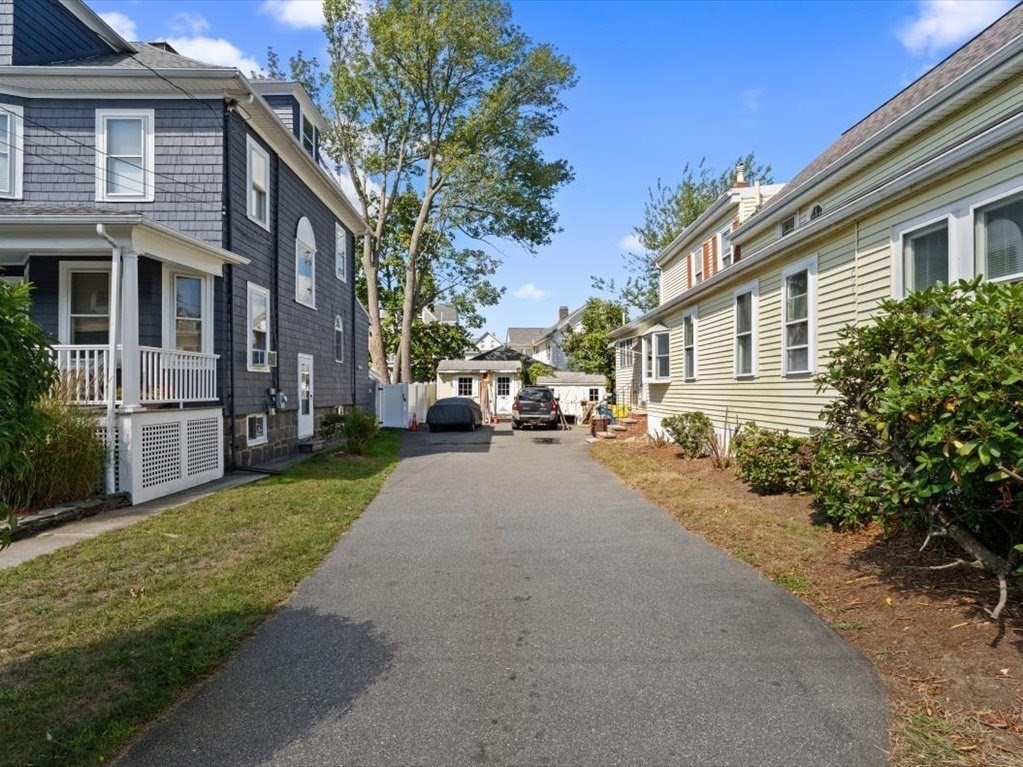 41 Sargent Street Winthrop, MA 02152 - Photo 6 of 40 a couple of cars parked in front of a house