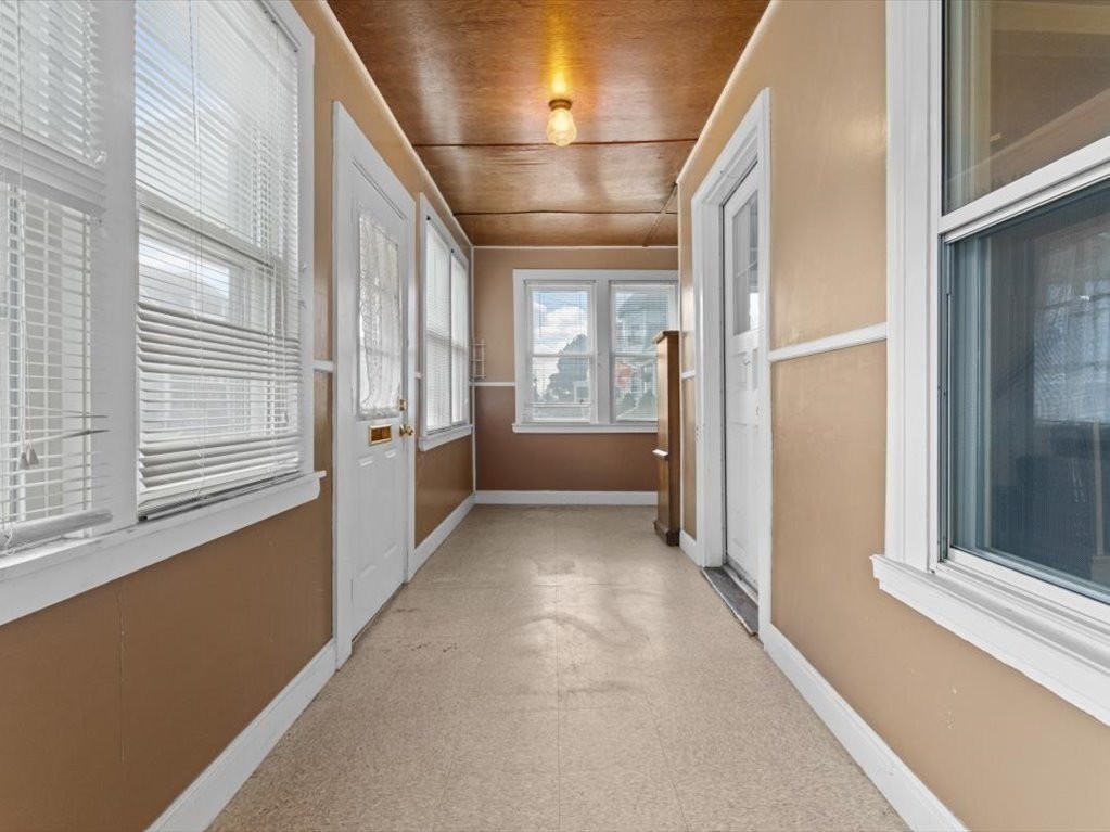 41 Sargent Street Winthrop, MA 02152 - Photo 8 of 40 a view of a hallway with windows