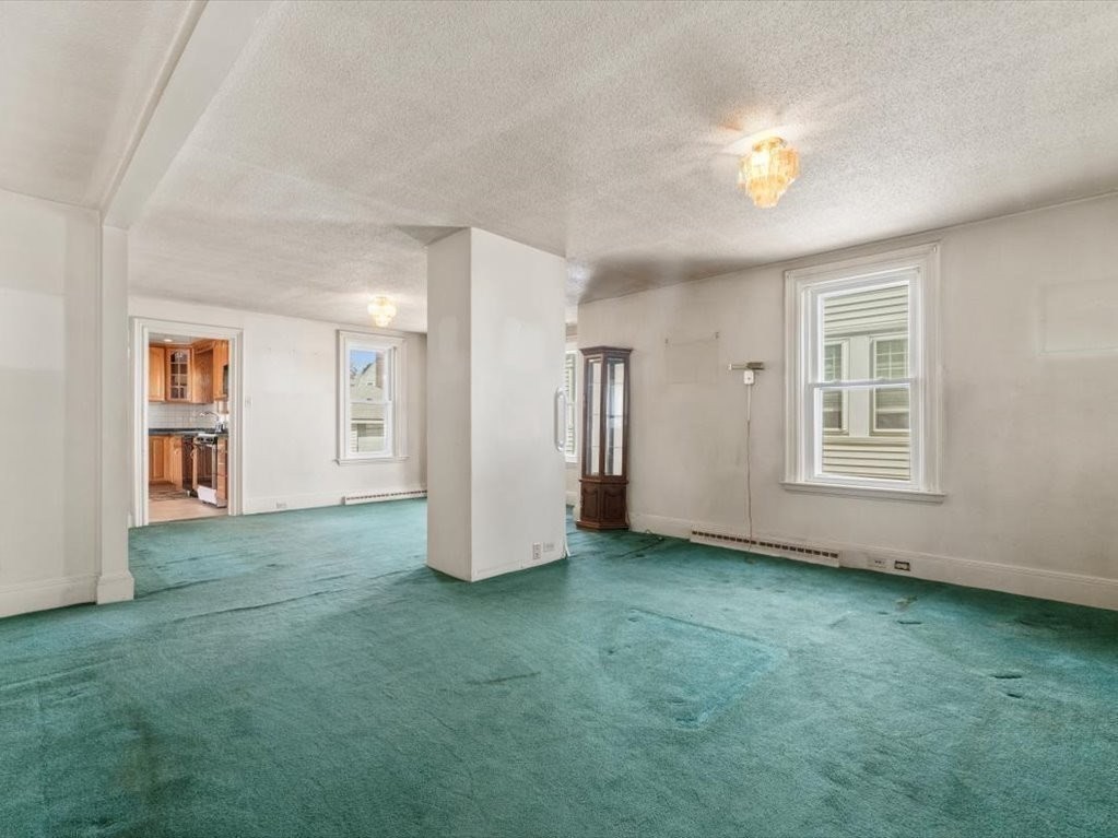 41 Sargent Street Winthrop, MA 02152 - Photo 10 of 40 a view of an empty room with closet and a window