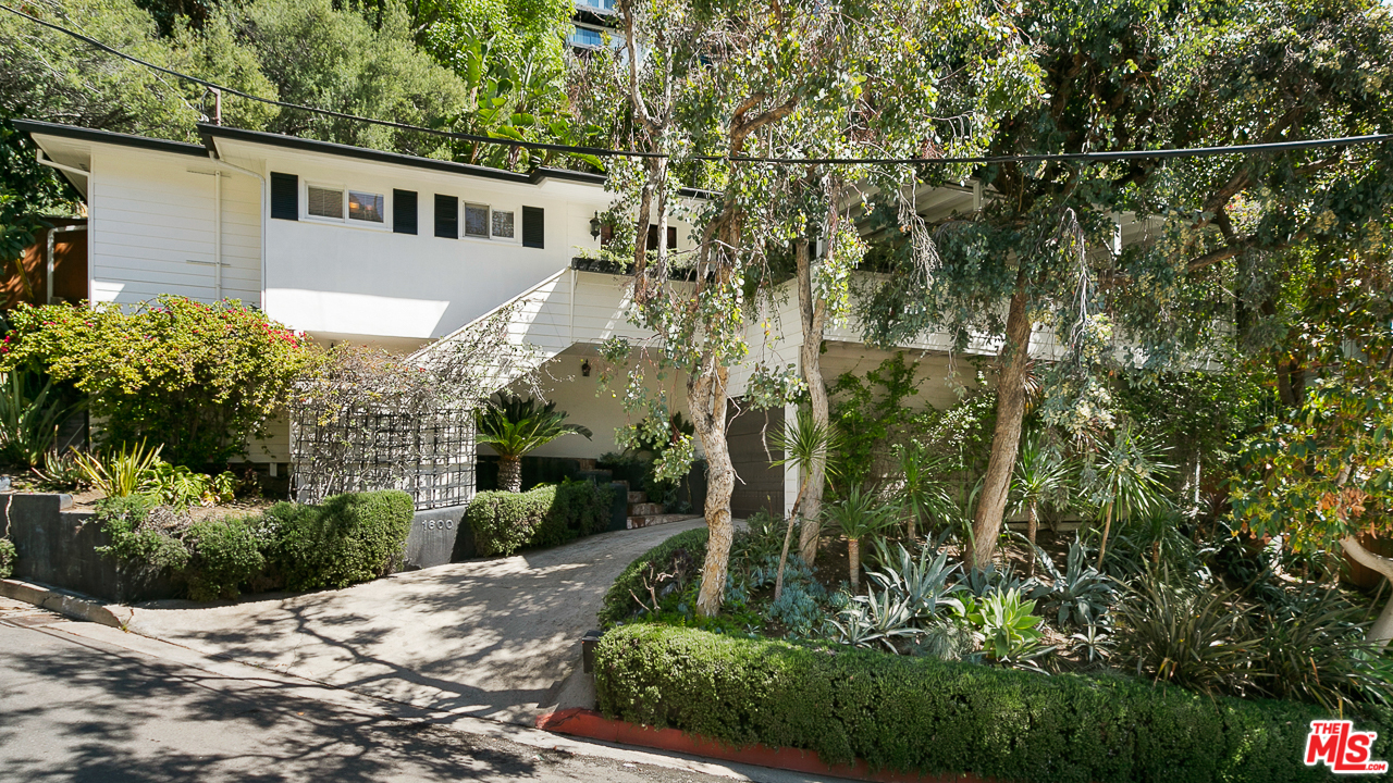 1600 Queens Road Los Angeles, CA 90069 - Photo 2 of 35 a view of a house with a tree