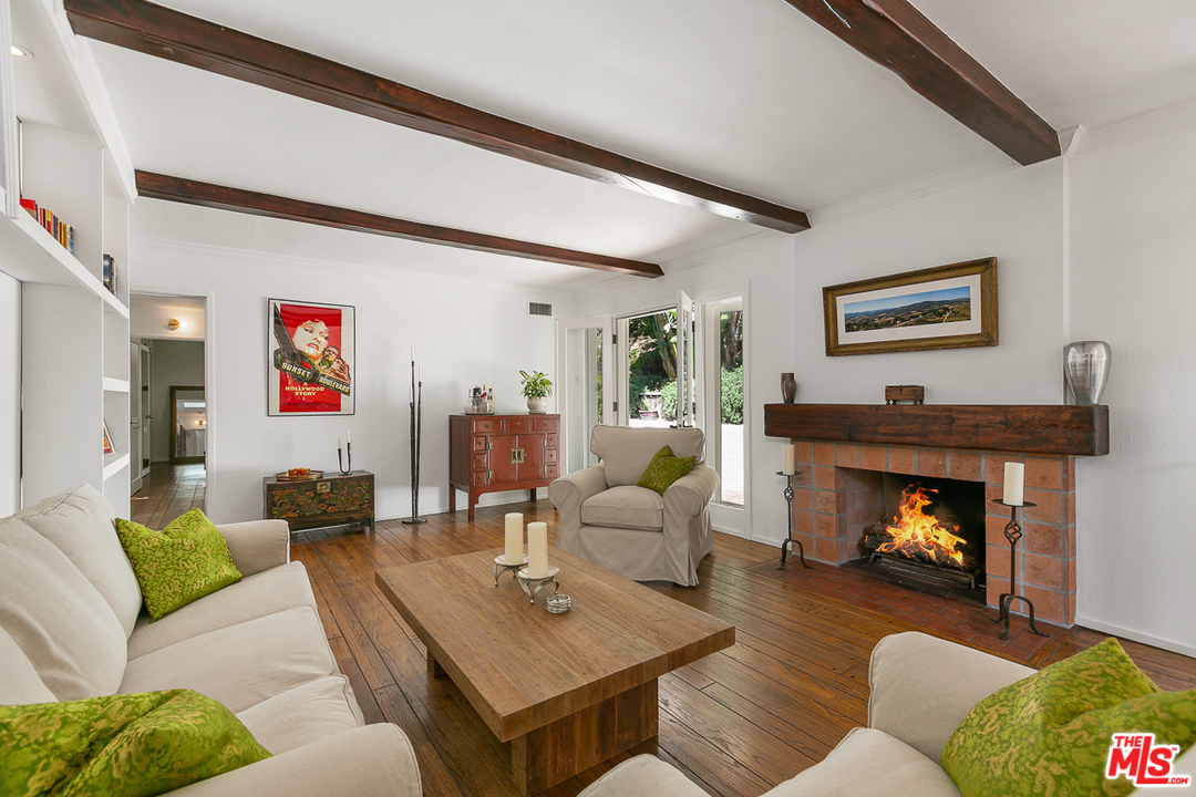 1600 Queens Road Los Angeles, CA 90069 - Photo 11 of 35 a living room with furniture and a fireplace