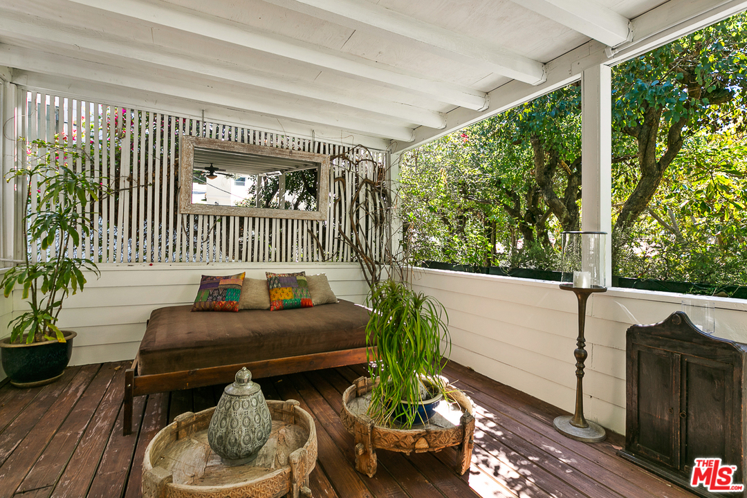 1600 Queens Road Los Angeles, CA 90069 - Photo 18 of 35 a living room filled with furniture and a potted plant