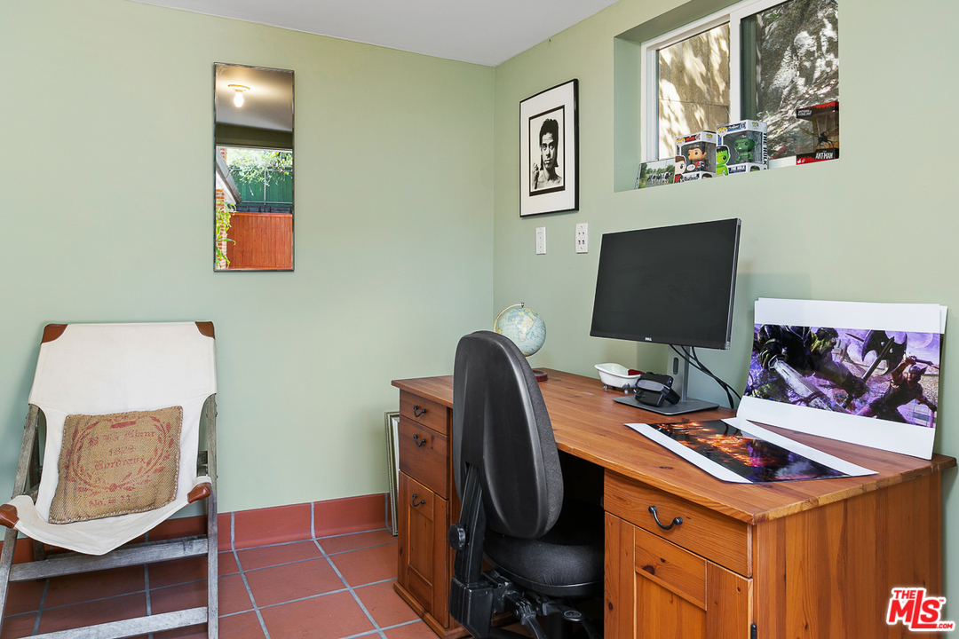 1600 Queens Road Los Angeles, CA 90069 - Photo 24 of 35 a view of a workspace with furniture and a window