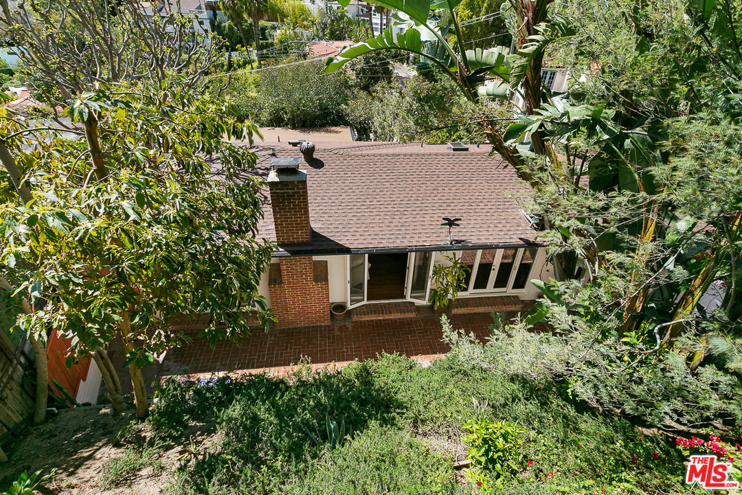 1600 Queens Road Los Angeles, CA 90069 - Photo 30 of 35 an aerial view of a house with yard and trees all around