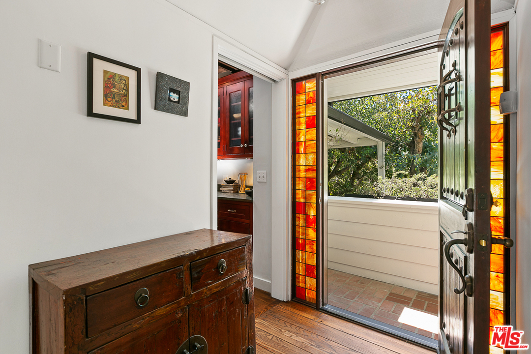 1600 Queens Road Los Angeles, CA 90069 - Photo 6 of 35 a view of front door and wooden floor
